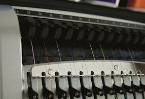 Tensão automática da linha – Acti-Feed – Melco EMT16plus máquina de bordar