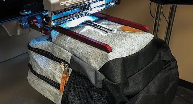 Bordados em mochilas e bolsas – Melco Fast Clamp