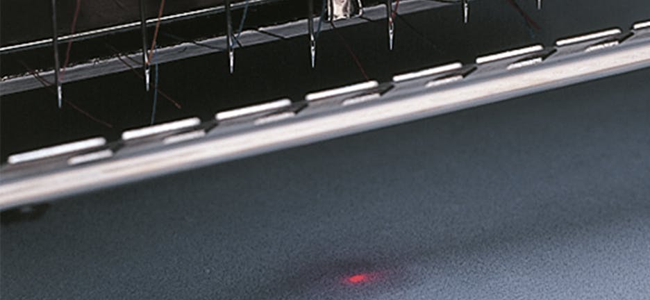 Posicionamento a laser – Melco máquina de bordar